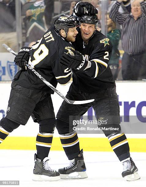 Steve Ott of the Dallas Stars celebrates a short-handed goal with Nicklas Grossman against the San Jose Sharks at American Airlines Center on March...