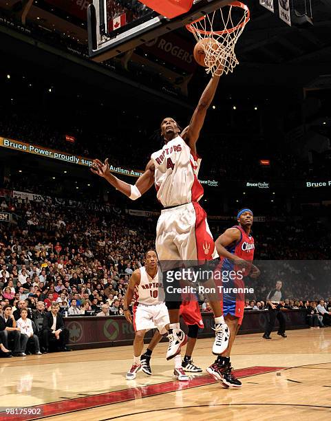 Chris Bosh of the Toronto Raptors comes down with the board during a game against the Los Angeles Clippers on March 31, 2010 at the Air Canada Centre...