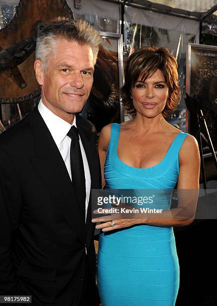 Actor Harry Hamlin and TV personality Lisa Rinna arrives to the premiere of Warner Bros. "Clash Of The Titans" held at Grauman's Chinese Theatre on...