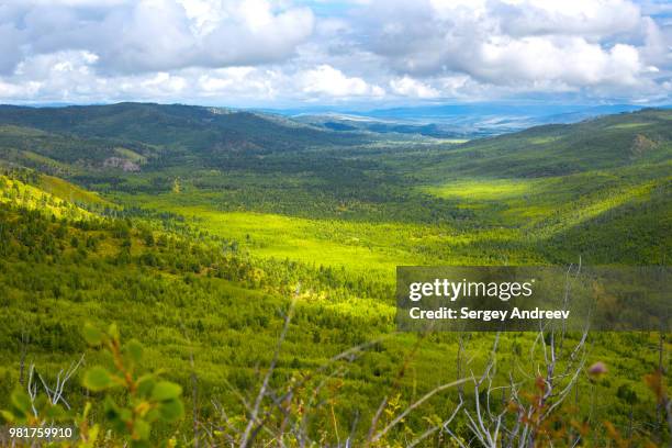 flying over the mountains 4 - andreev stock pictures, royalty-free photos & images