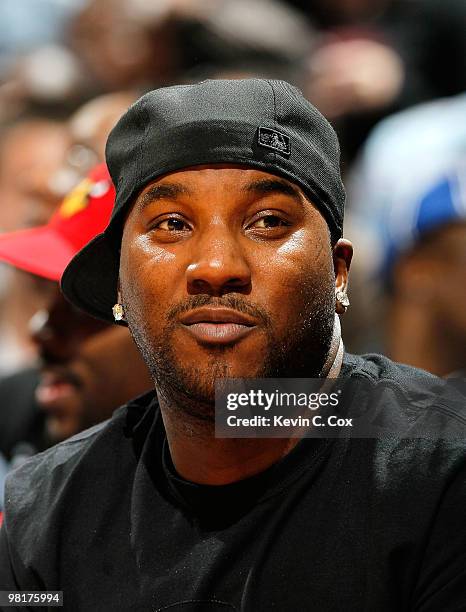 Rapper Young Jeezy watches during the game between the Los Angeles Lakers and the Atlanta Hawks at Philips Arena on March 31, 2010 in Atlanta,...