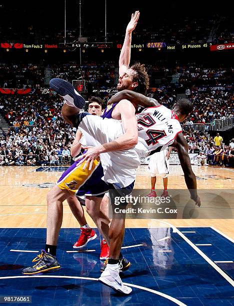 Marvin Williams of the Atlanta Hawks fouls Pau Gasol of the Los Angeles Lakers at Philips Arena on March 31, 2010 in Atlanta, Georgia. NOTE TO USER:...