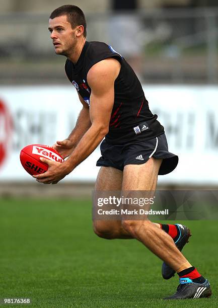 Brent Stanton of the Bombers looks for a teammate during an Essendon Bombers AFL training session at Windy Hill on April 1, 2010 in Melbourne,...