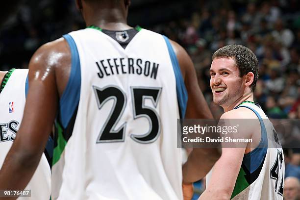 Kevin Love shares a laugh with teammate Al Jefferson of the Minnesota Timberwolves during the game against the Sacramento Kings on March 31, 2010 at...
