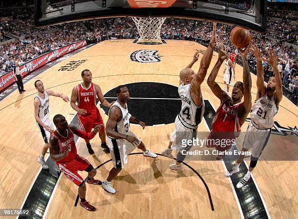 Trevor Ariza of the Houston Rockets shoots against Richard Jefferson of the San Antonio Spurs on March 31, 2010 at the AT&T Center in San Antonio,...