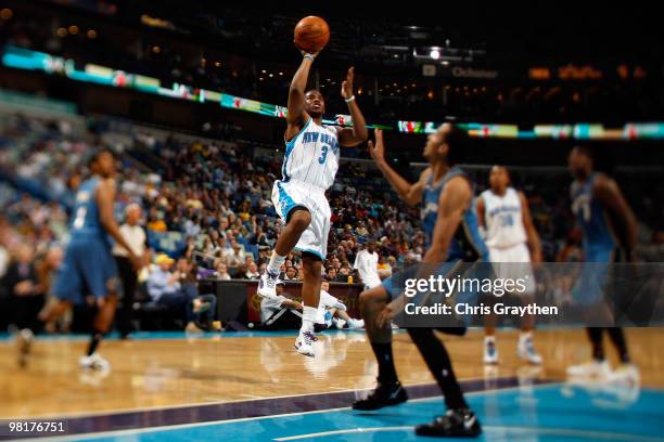 Chris Paul of the New Orleans Hornets shoots the ball over Shaun Livingston of the Washington Wizards at New Orleans Arena on March 31, 2010 in New...