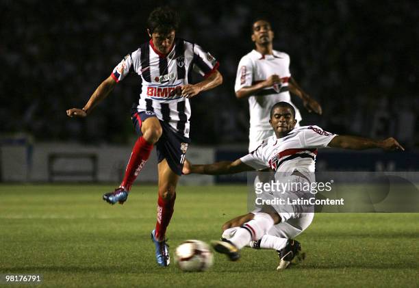 Neri Cardozo of Mexico's Monterrey fights for the ball with Alex Silva of Brazil's Sao Paulo FC during a 2010 Libertadores Cup soccer match between...