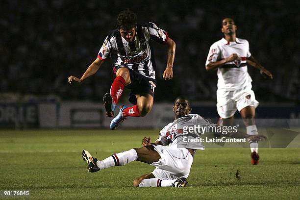Neri Cardozo of Mexico's Monterrey fights for the ball with Alex Silva of Brazil's Sao Paulo FC during a 2010 Libertadores Cup soccer match between...