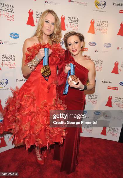 Ashleigh McIvor and Joannie Rochette pose backstage at the Heart Truth fashion show at the Allstream Centre on March 31, 2010 in Toronto, Canada.