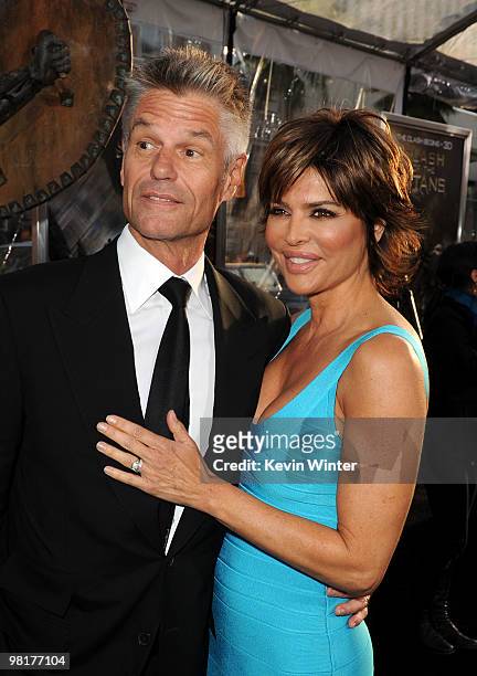 Actor Harry Hamlin and TV personality Lisa Rinna arrives to the premiere of Warner Bros. "Clash Of The Titans" held at Grauman's Chinese Theatre on...
