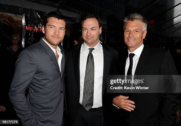 Actor Sam Worthington, executive producer Thomas Tull and actor Harry Hamlin arrive to the premiere of Warner Bros. "Clash Of The Titans" held at...