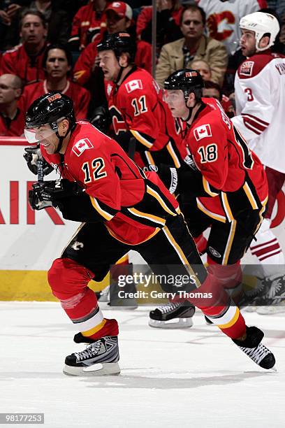 Jarome Iginla, Matt Stajan and Niklas Hagman of the Calgary Flames skate against Keith Yandle of the Phoenix Coyotes on March 31, 2010 at Pengrowth...