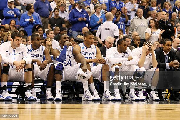 Players from the Kentucky Wildcats look on dejected from the bench in the final minutes of the seocnd half against the West Virginia Mountaineers...