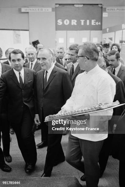 Le premier ministre Georges Pompidou à la Foire de Paris à Paris en France, le 20 mai 1967.