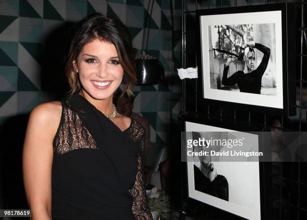 Actress/photographer Shenae Grimes poses with her photographs at the St. Jude's Children's Research Hospital benefit hosted by her at the Avalon...