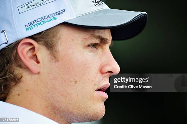 Nico Rosberg of Germany and Mercedes GP walks in the paddock during previews to the Malaysian Formula One Grand Prix at the Sepang Circuit on April...