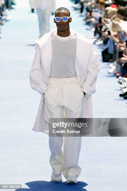 Model walks the runway during the Louis Vuitton Menswear Spring/Summer 2019 show as part of Paris Fashion Week on June 21, 2018 in Paris, France.