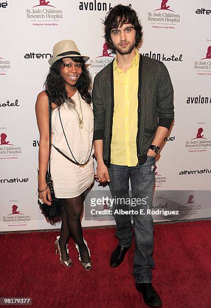 Actress Brandee Tucker and actor Michael Steger pose on the red carpet at a benefit for St. Jude Children's Hospital hosted by actress Shenae Grimes...