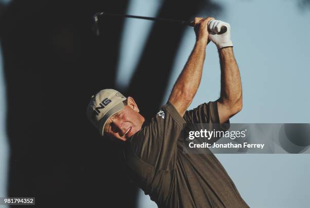 Bruce Summerhays of the United States hits an iron shot off the tee during the Senior Tour Championship golf tournament on 7 November 1999 at theThe...