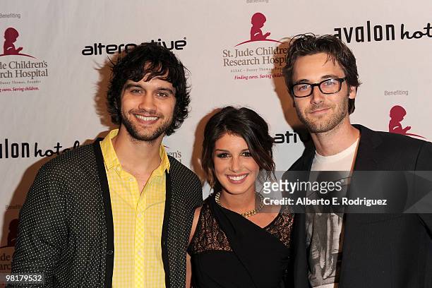 Actor Michael Steger, actress Shenae Grimes and actor Ryan Eggold pose on the red carpet at a benefit for St. Jude Children's Hospital hosted by...