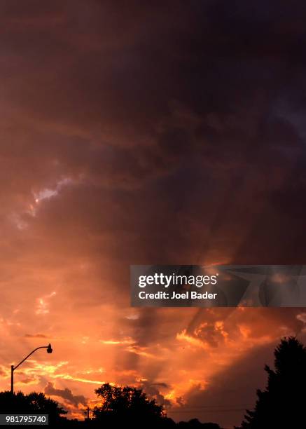 orange spotlight trumpets the morning in west des moines! - west orange stockfoto's en -beelden