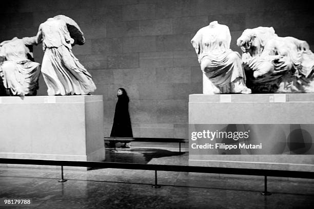 Woman looks at he Parthenon Statues at the British Museum, on January 9, 2009 in London, England.