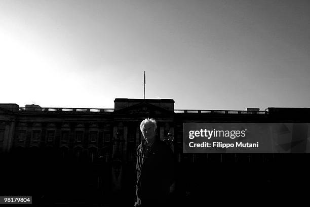 Tourist walks in front of Buckingam Palace, on January 9, 2009 in London, England.