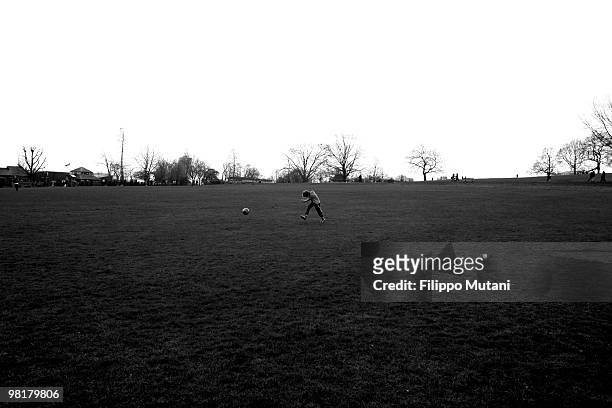Boy plays soccer in Parliament Hill, on January 9, 2009 in London, England.