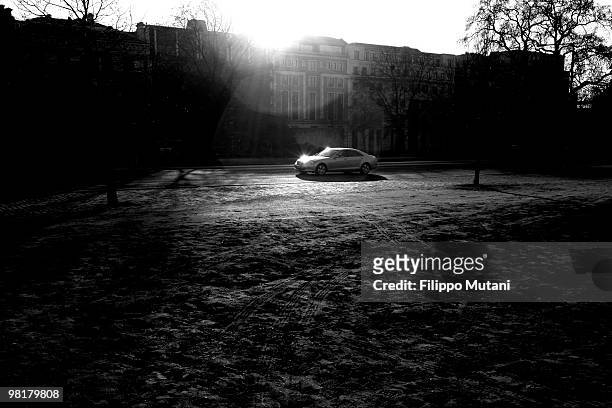 Mercedes Benz drives through the park, between Knightsbridge and Hyde Park,on January 9, 2009 in London, England.