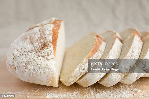 home made pain de campagne cut in piece - pain boule stock pictures, royalty-free photos & images