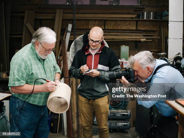 Sauk Valley reporter Gavin Jensen and photographer Alex Paschal on assignment in Dixon resident Dan Gascoigne's garage. The two worked on a story...