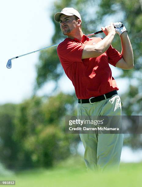 Robert Karlsson from Sweden, hits from the fairway on the par 5 , 3nd. Hole, during the third day of the 2001 Heineken Classic, which is being played...