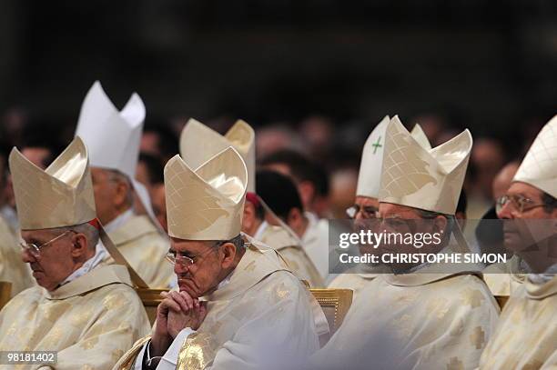 Eccliesiastics attends Pope Benedict XVI's Holy Thursday Chrism mass as part of the Holy week on April 01, 2010 at St Peter's Basilica at the...