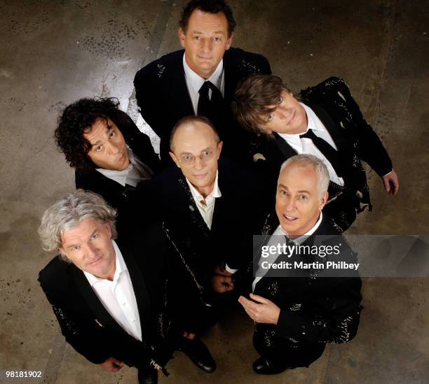 Tim Finn, Malcolm Green, Noel Crombie, Neil Finn, Eddie Rayner and Nigel Griggs of Split Enz pose for a group portrait on 1st February 2006 in...