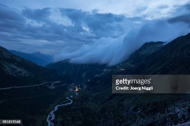rhone river in grimsel pass and swiss alps at night, valais, switzerland - rhone river stock pictures, royalty-free photos & images
