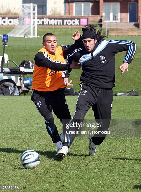 Jonas Gutierrez and Danny Simpson during a Newcastle United training session at the Little Benton training ground on April 01, 2010 in Newcastle,...