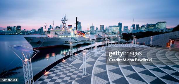 harumi kai and skyline tokyo, japan - modern battleship stock pictures, royalty-free photos & images