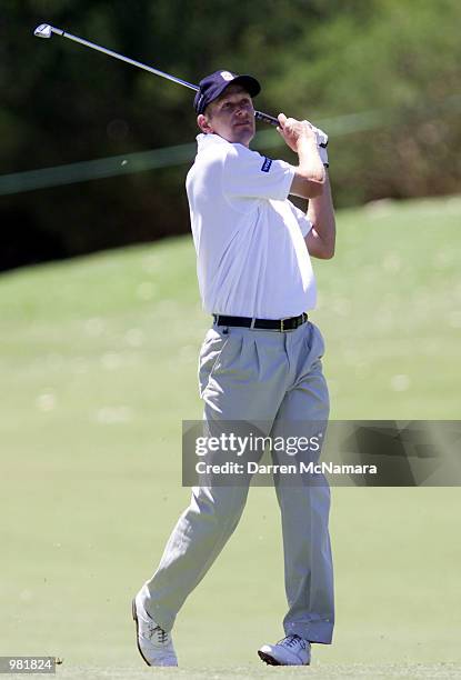 Steen Tinning from Denmark, hits from the fairway on the par 5 , 3nd. Hole, during the third day of the 2001 Heineken Classic, which is being played...