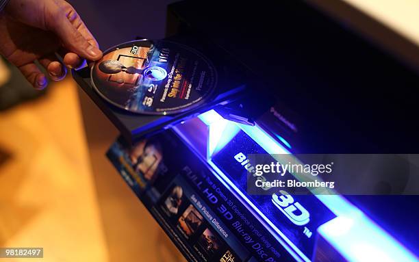 Movie is loaded into a Panasonic Corp. 3-D Blu-ray disc player at the headquarters of Panasonic U.K. In London, U.K., on Wednesday, March 31, 2010....