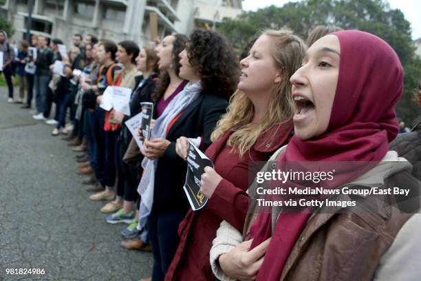 Somaya Abdelgany along with other students hold a demonstration against sexual harassment outside Wurster Hall on the campus of UC Berkeley in...