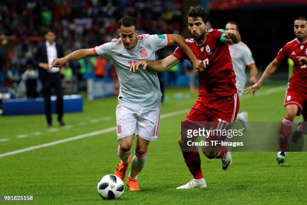 Lucas Vazquez of Spain and Ansarifard of Iran battle for the ball during the 2018 FIFA World Cup Russia group B match between Iran and Spain at Kazan...
