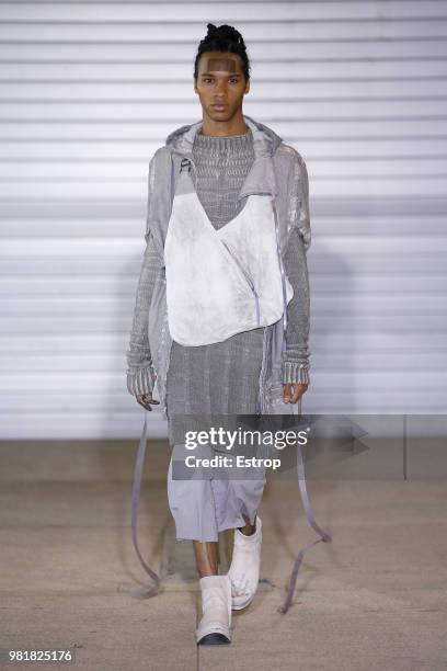 Model walks the runway during the Boris Bidjan Saberi Menswear Spring/Summer 2019 show as part of Paris Fashion Week on June 21, 2018 in Paris,...