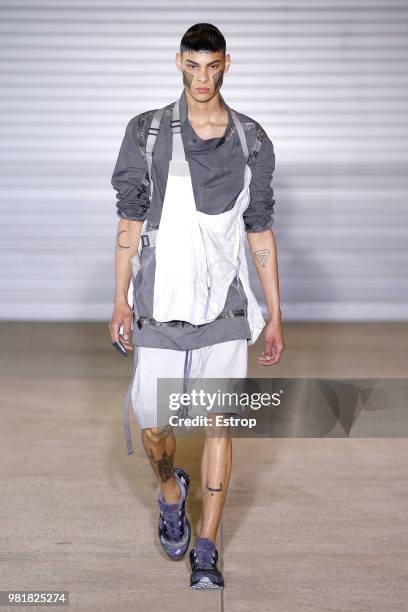 Model walks the runway during the Boris Bidjan Saberi Menswear Spring/Summer 2019 show as part of Paris Fashion Week on June 21, 2018 in Paris,...