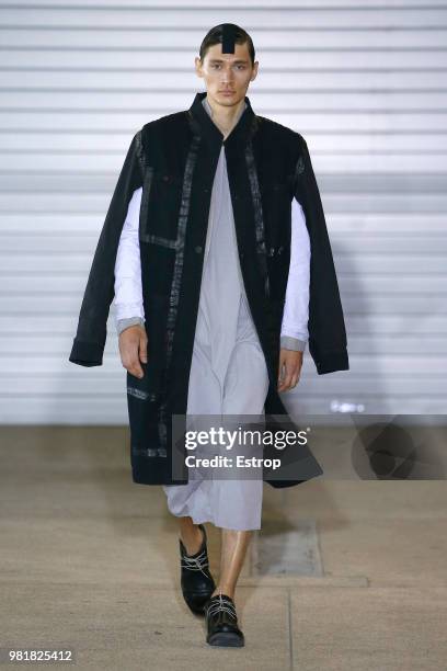 Model walks the runway during the Boris Bidjan Saberi Menswear Spring/Summer 2019 show as part of Paris Fashion Week on June 21, 2018 in Paris,...