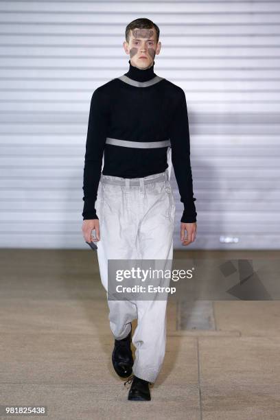 Model walks the runway during the Boris Bidjan Saberi Menswear Spring/Summer 2019 show as part of Paris Fashion Week on June 21, 2018 in Paris,...