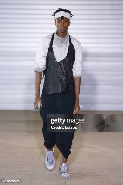 Model walks the runway during the Boris Bidjan Saberi Menswear Spring/Summer 2019 show as part of Paris Fashion Week on June 21, 2018 in Paris,...