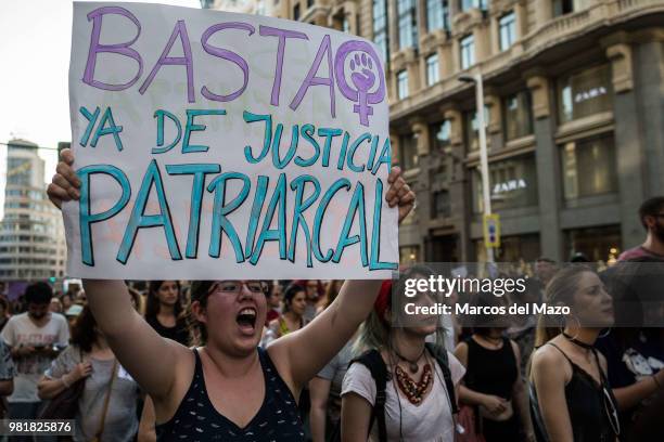 Protester holds a placard that reads "enough of patriarchal justice", during a protest against court's decision to release "wolf pack" gang on bail....