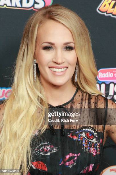 Carrie Underwood attends the 2018 Radio Disney Music Awards at Loews Hollywood Hotel on June 22, 2018 in Hollywood, California.