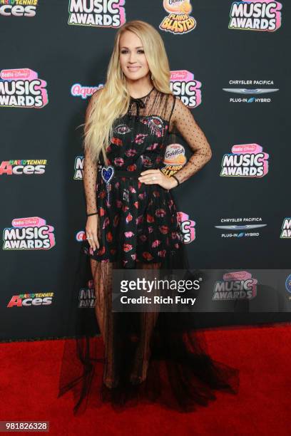 Carrie Underwood attends the 2018 Radio Disney Music Awards at Loews Hollywood Hotel on June 22, 2018 in Hollywood, California.