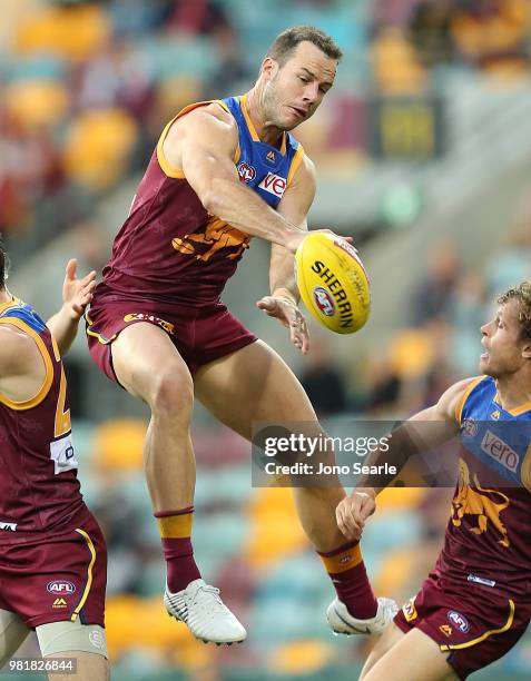 Josh Walker of the Lions spoils the ball during the round 14 AFL match between the Brisbane Lions and the Greater Western Sydney Giants at The Gabba...